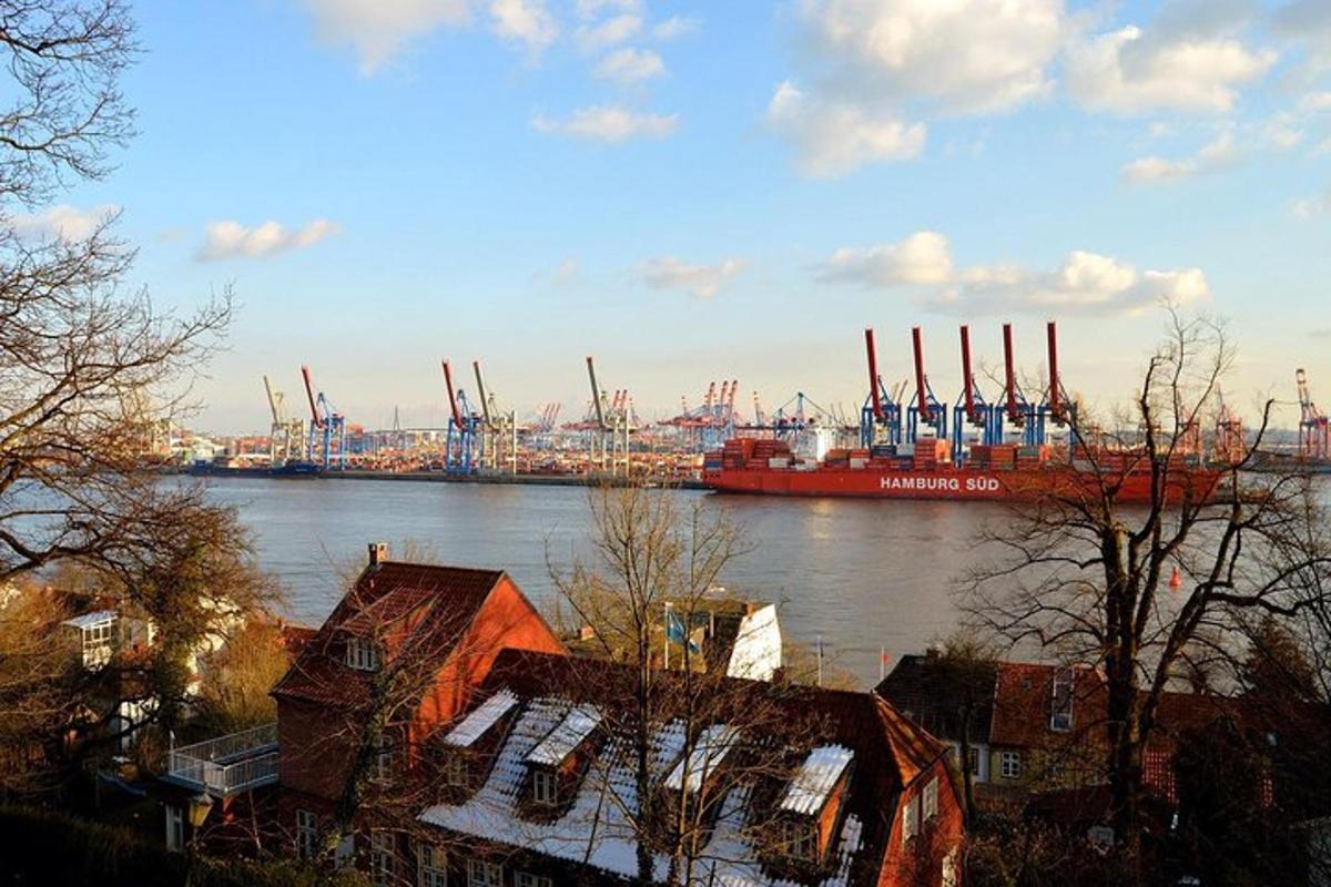 a large ship is docked in a river