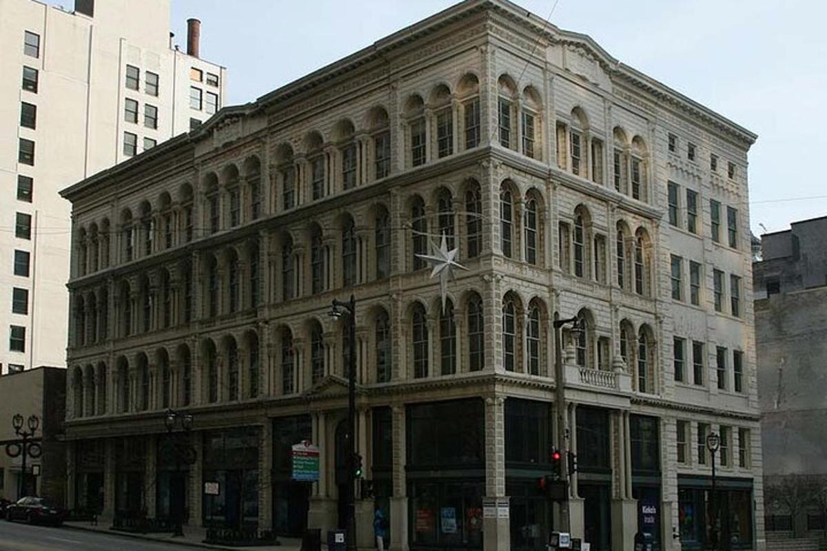a large building on the corner of a street
