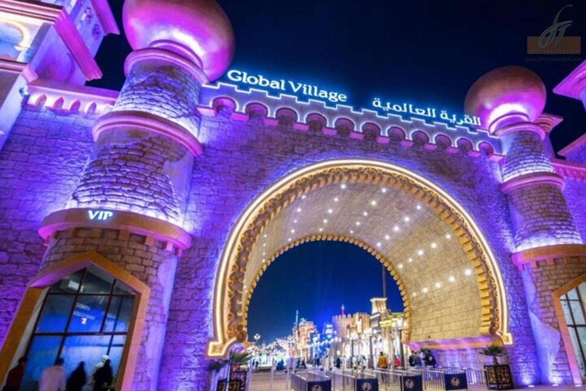 a building with a lit up archway at night