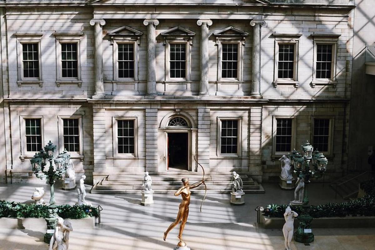 a building with statues in front of it