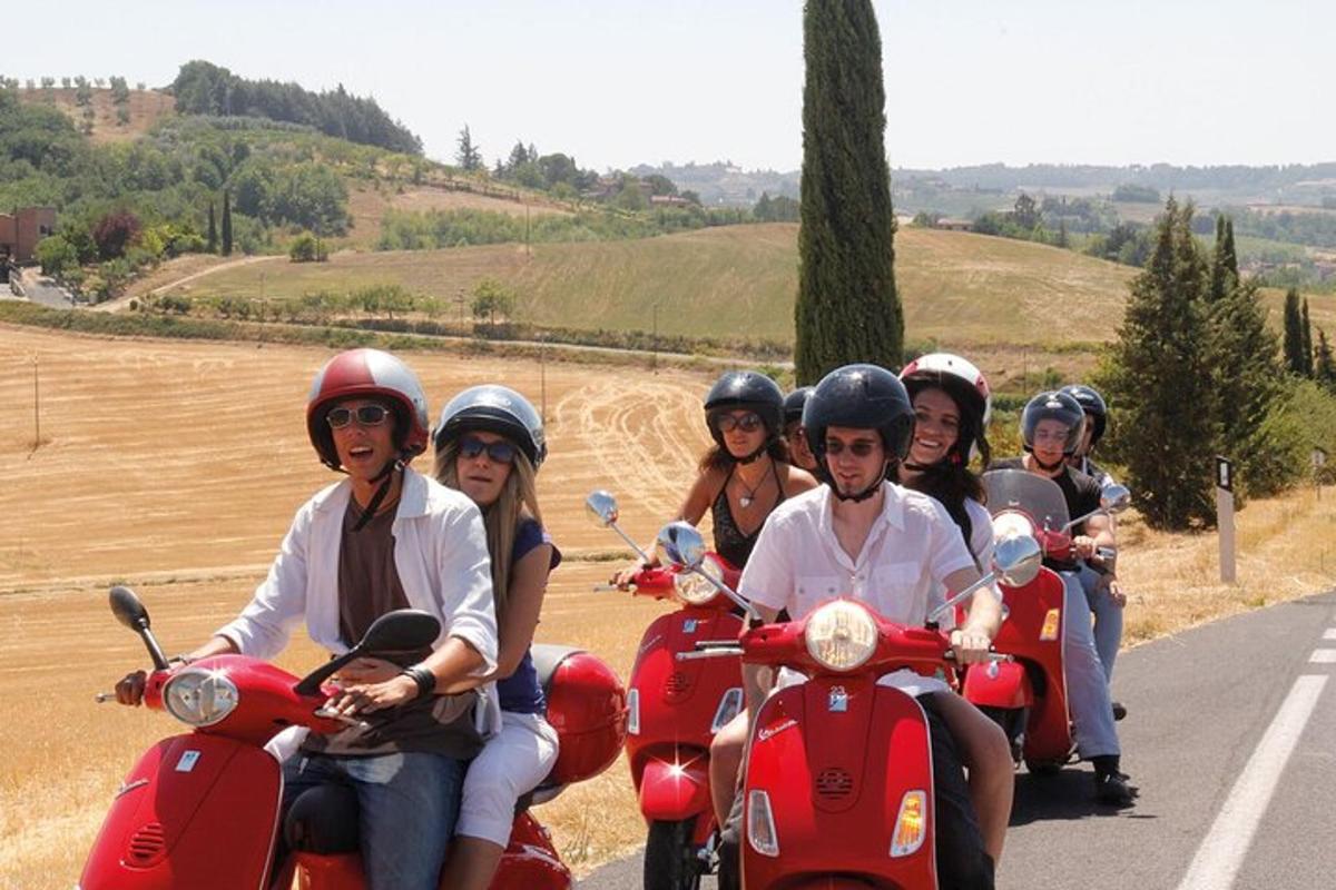 a group of people riding motorcycles on a road