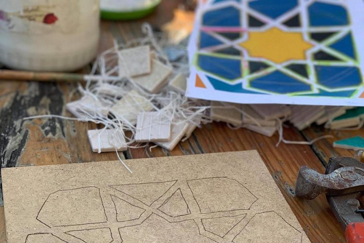 a wooden table with a piece of paper and a pair of scissors