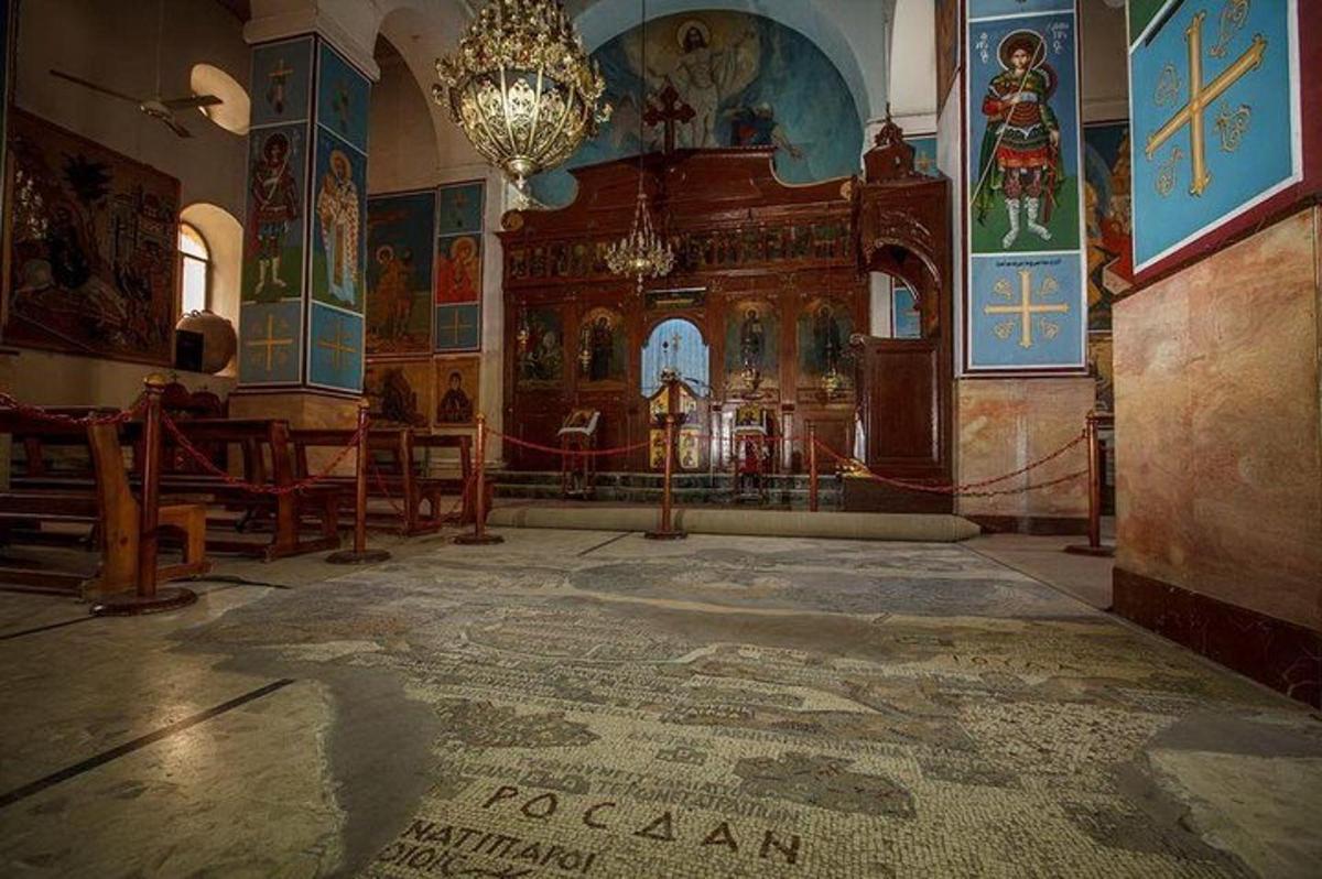 a large room with a church with a rug on the floor