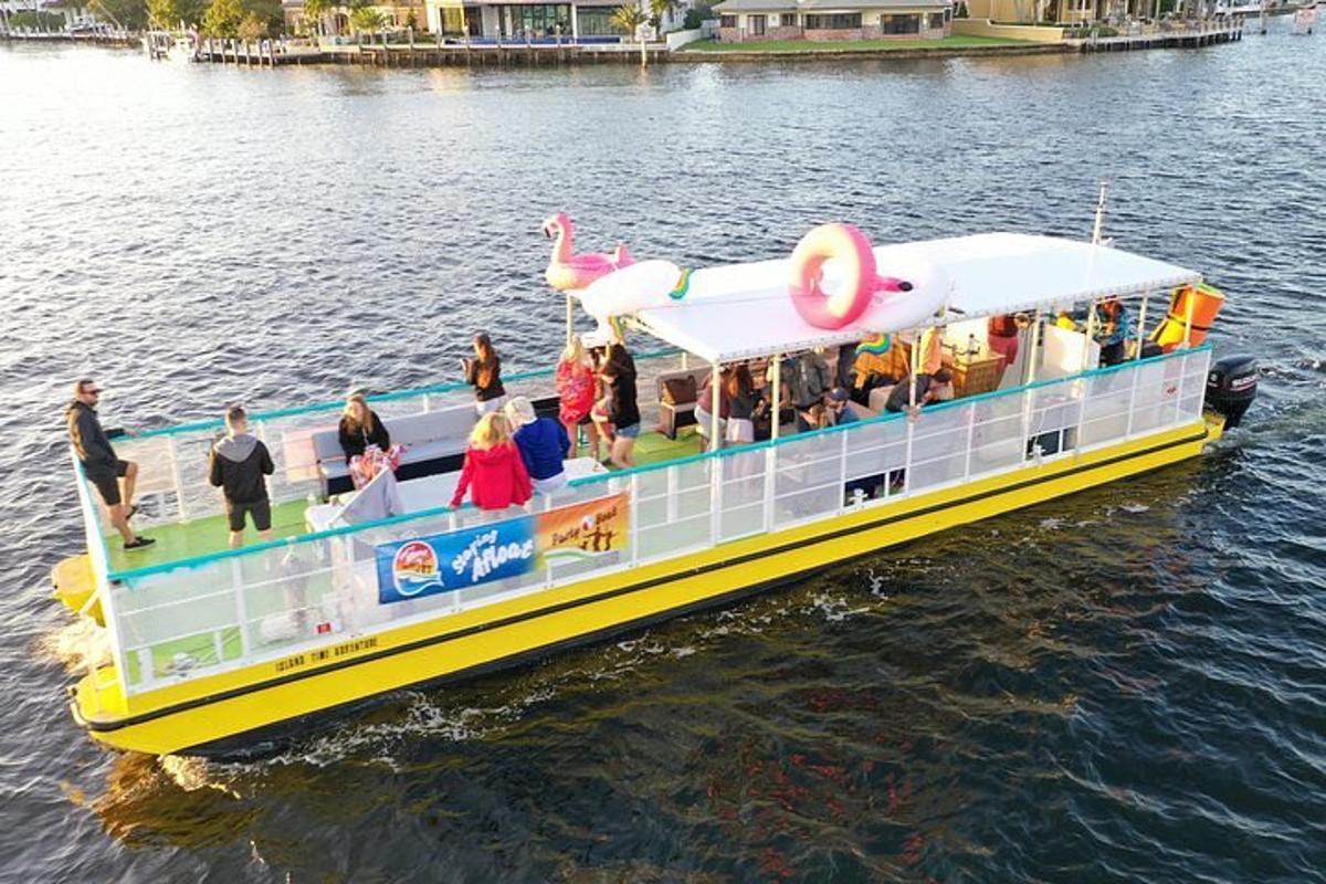 a group of people on a boat in the water