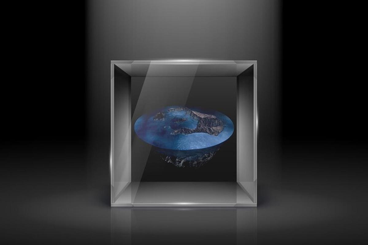 una scatola di vetro con un oggetto blu al suo interno