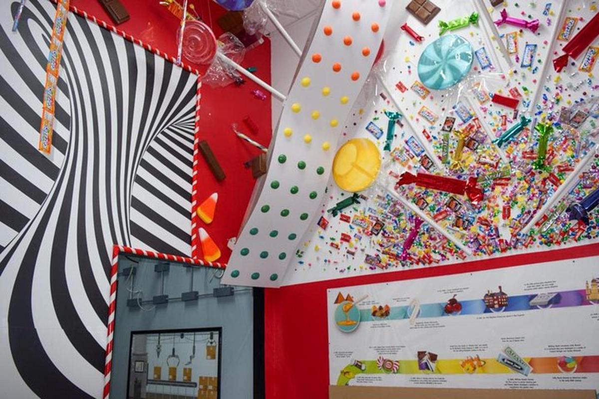 a room with a wall filled with lots of decorations
