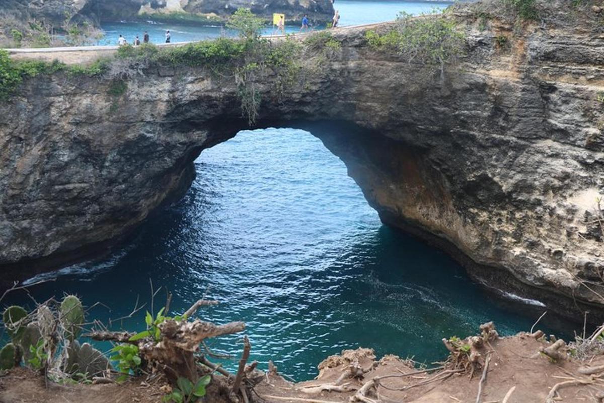 a large cave in the side of a cliff