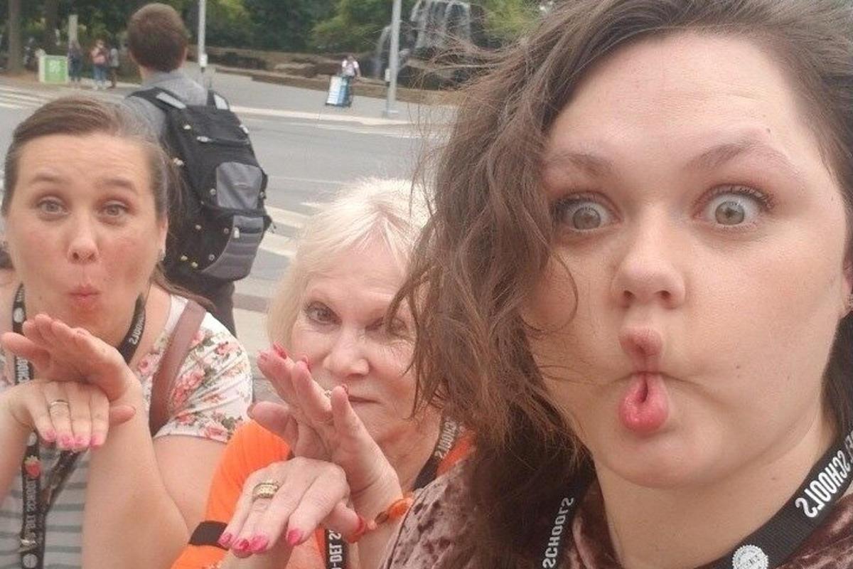 two women sticking their tongue out with their tongue