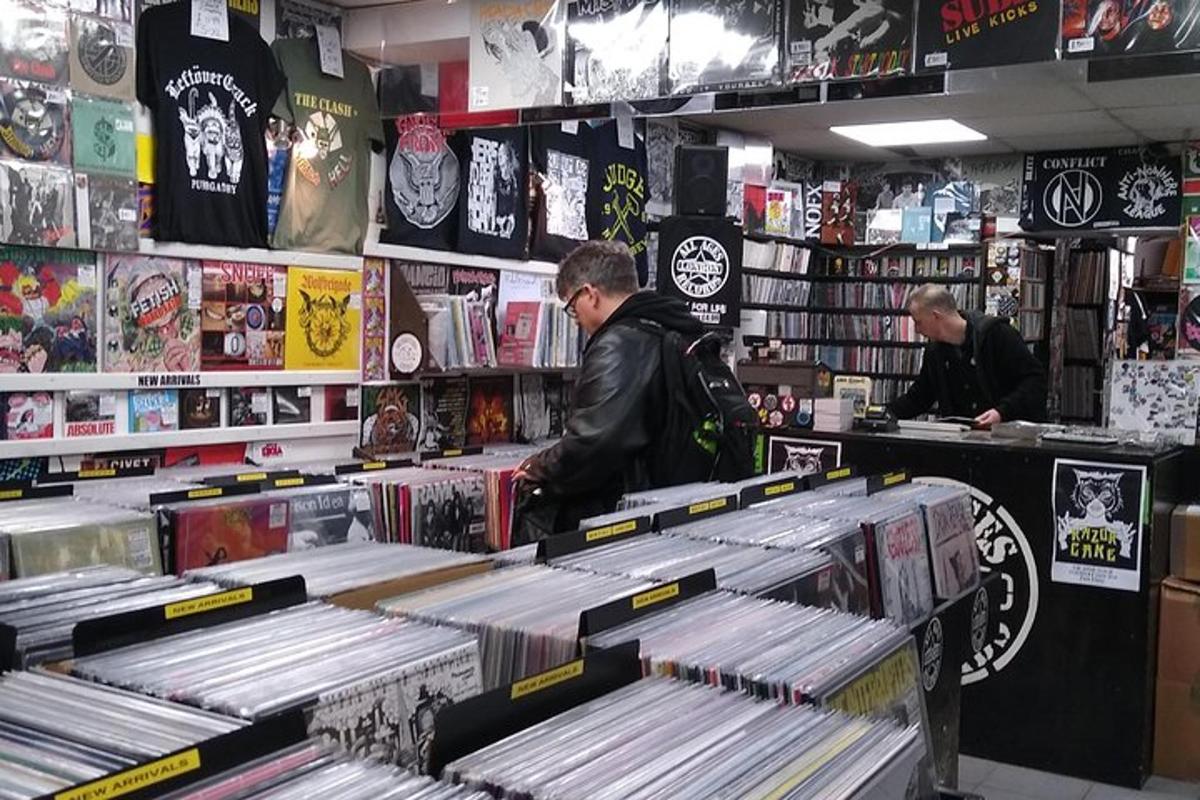 a man standing at a counter in a store