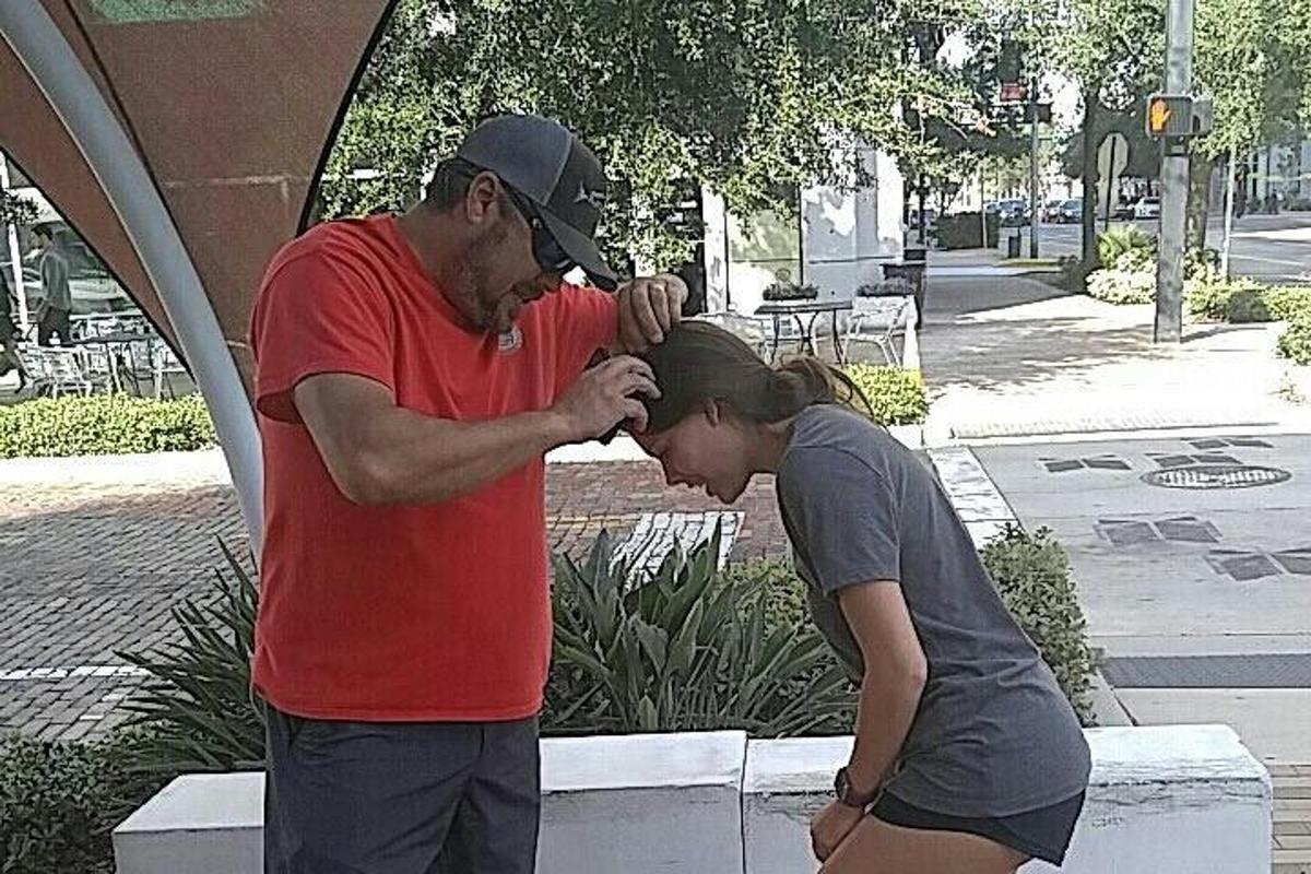 a man and a woman standing next to each other