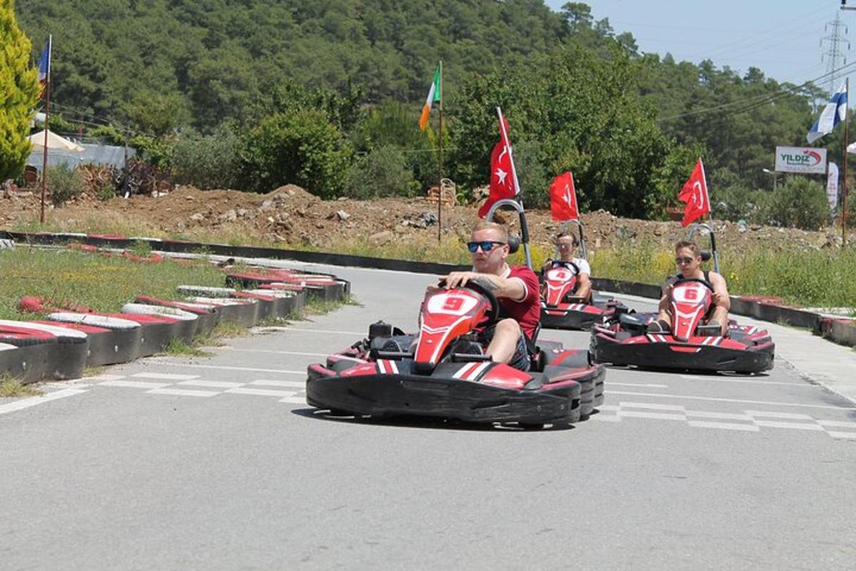 a group of people riding on an go karts