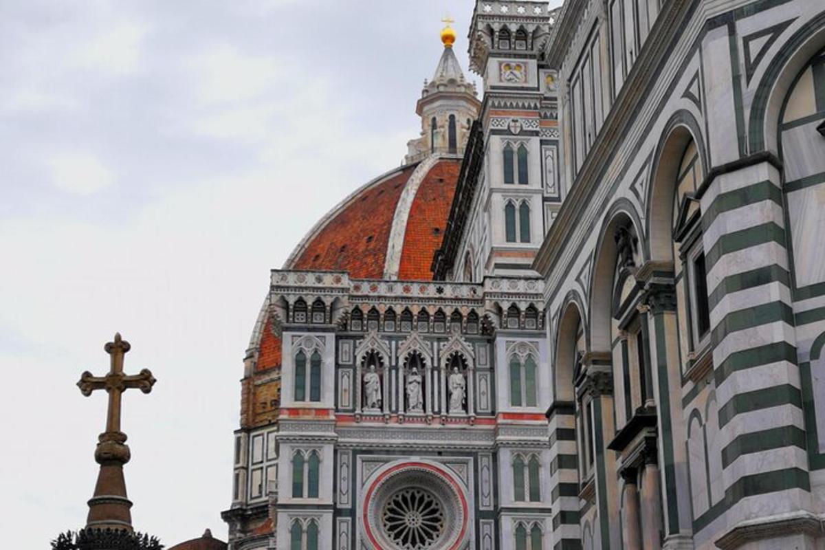 a church with a cross on the side of a building