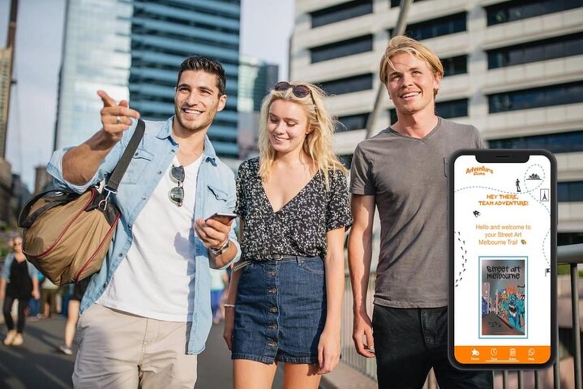 two men and a woman standing next to a cell phone