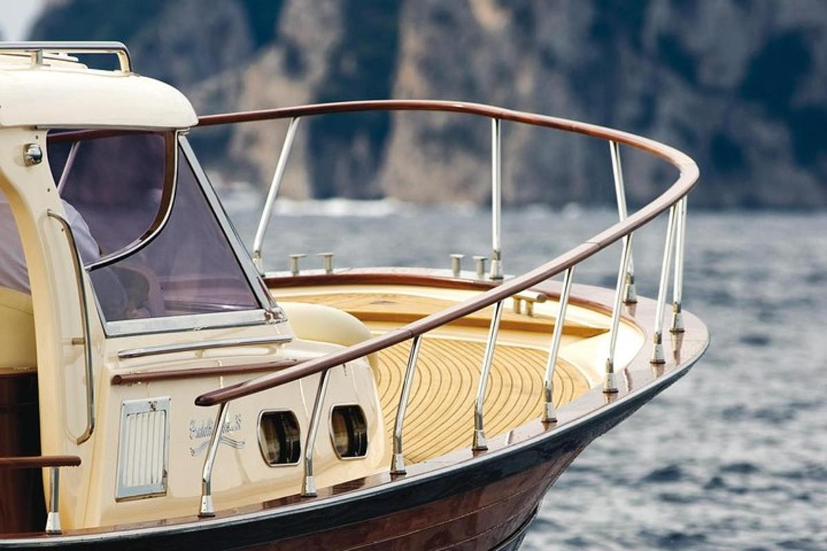 a boat sitting in the water on a body of water