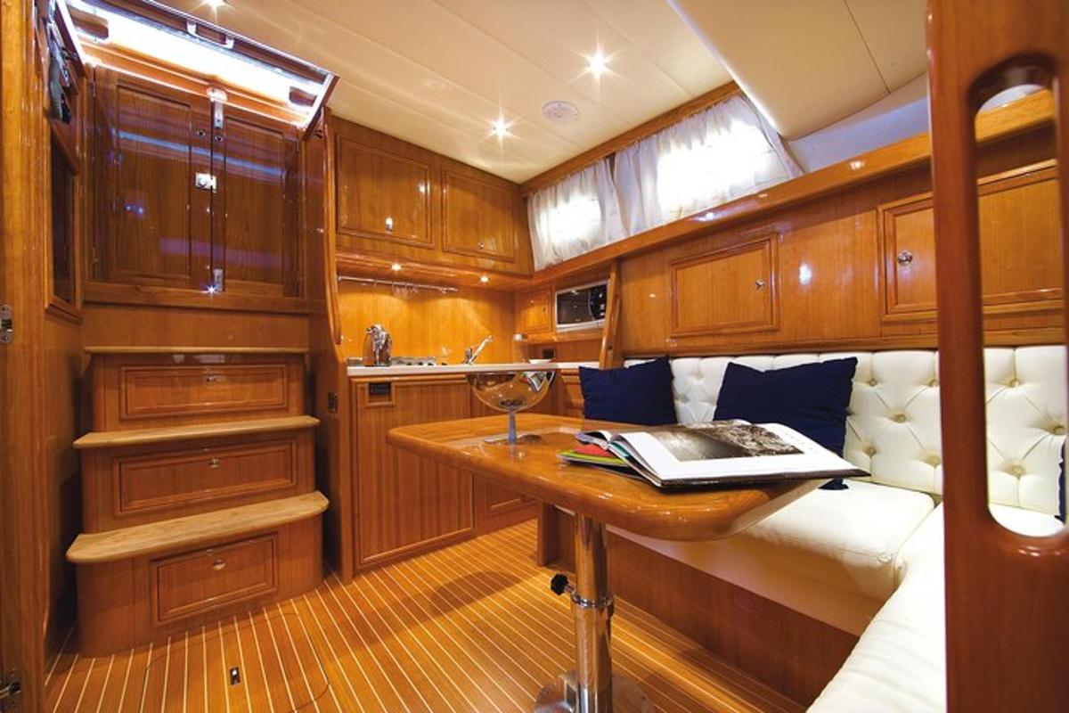 a small room with a desk in a boat