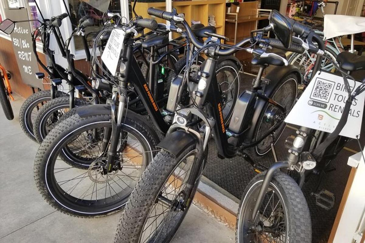 a row of bikes parked next to each other