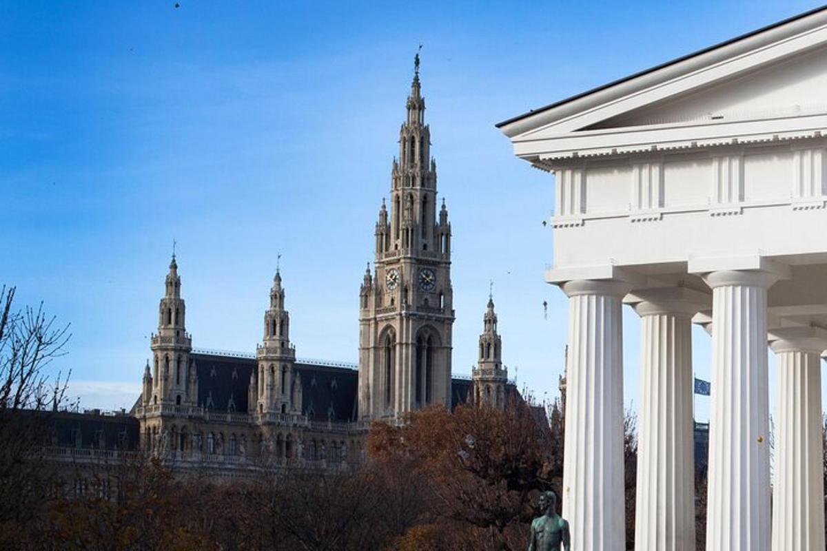 sebuah gedung tinggi dengan menara jam di latar belakang