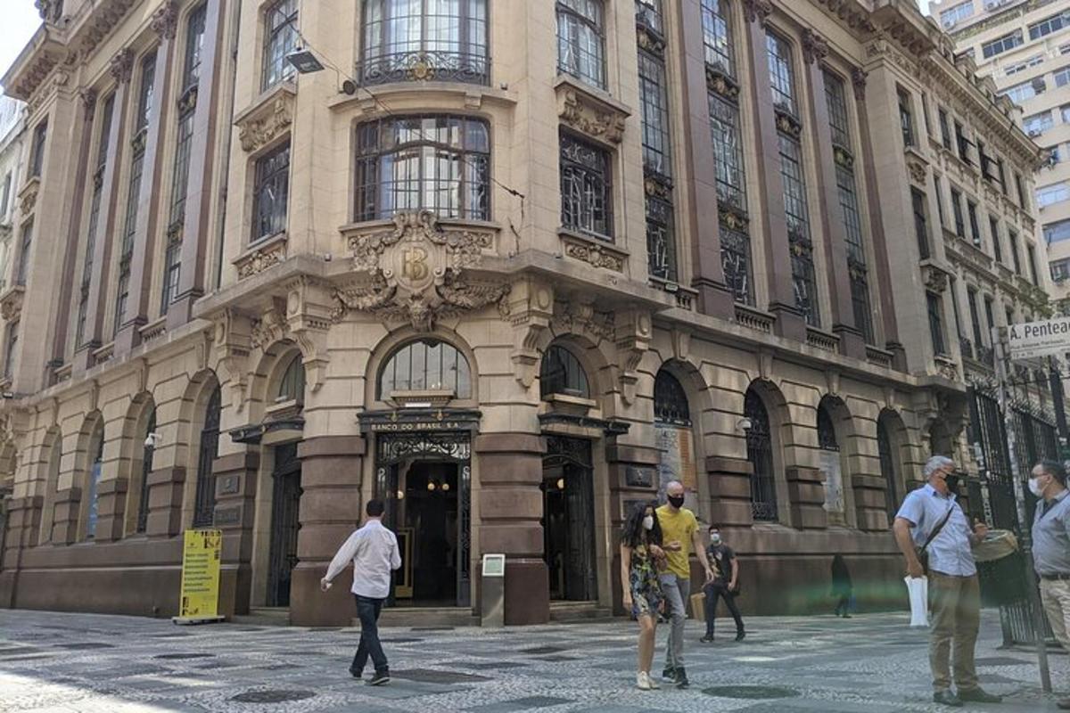 a group of people standing outside of a building