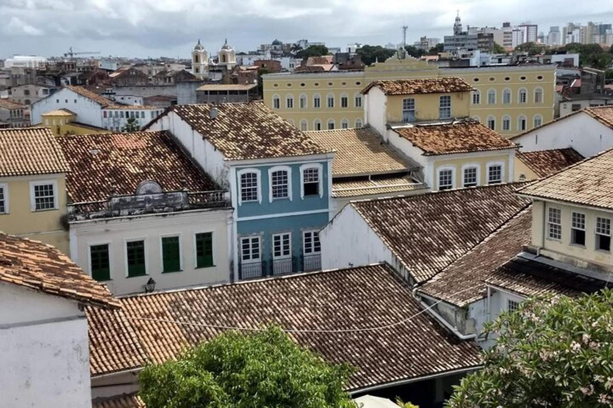 a view of roofs of buildings in a city