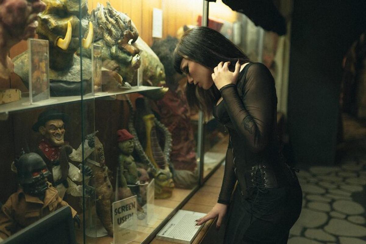 a woman is looking at a display in a store