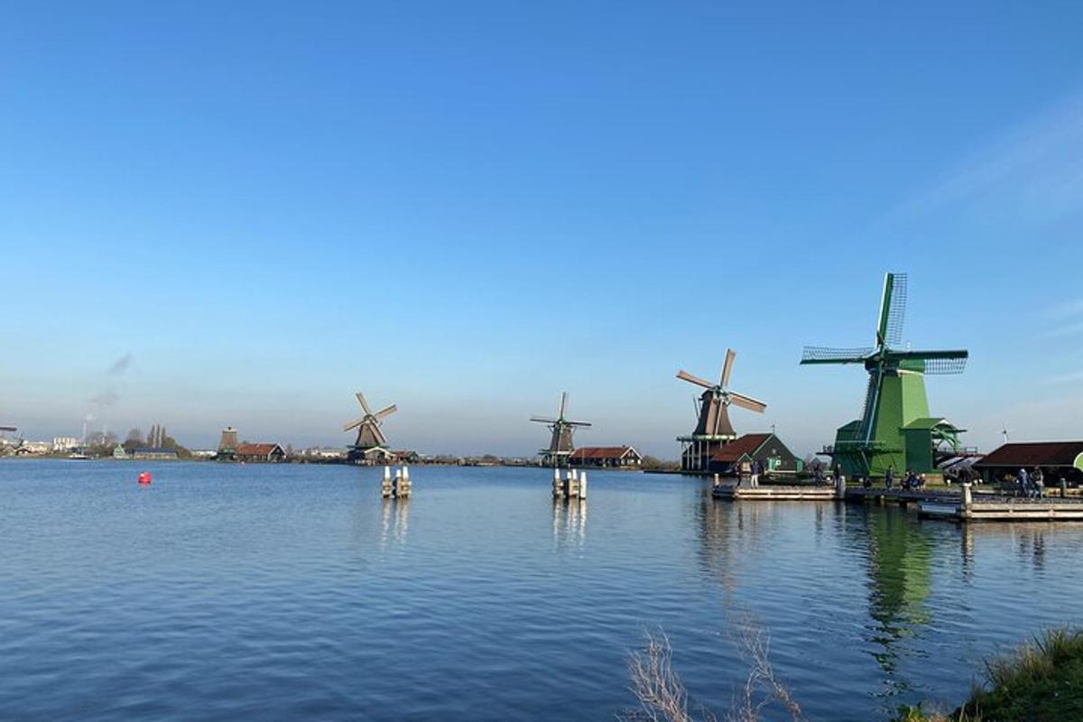 a group of windmills sitting in the water