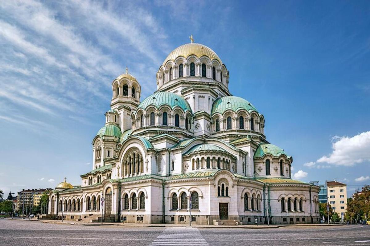 a large building with a green and white
