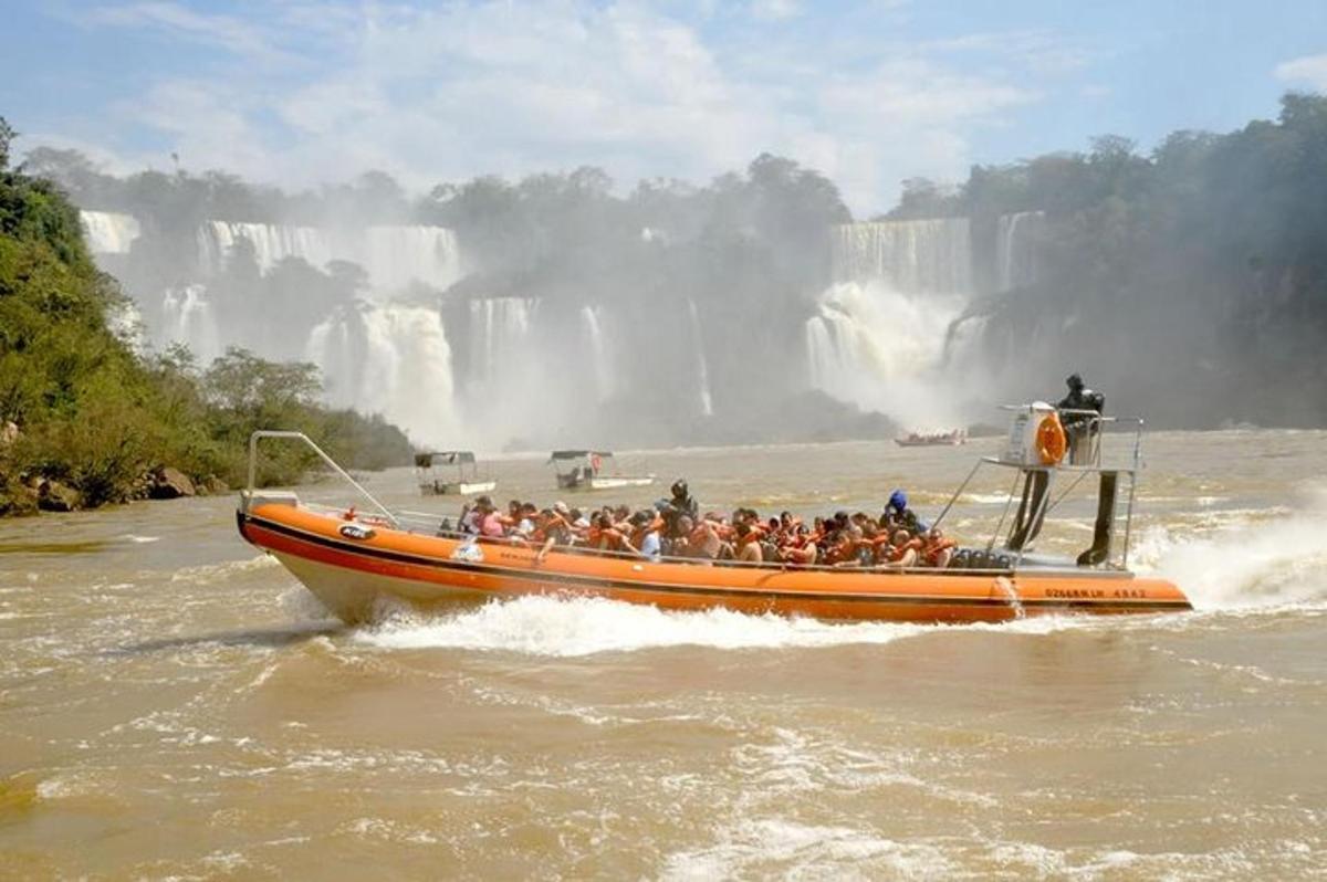 a group of people on a boat in the water