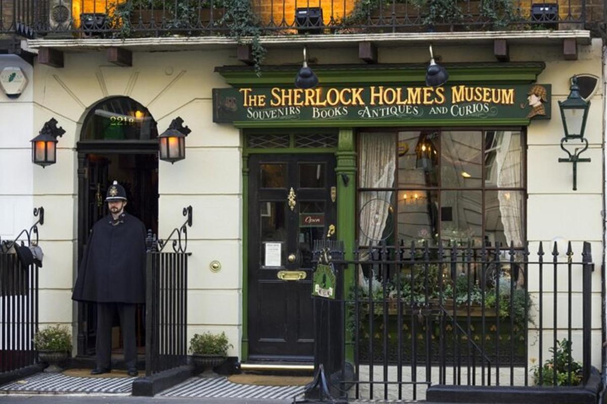 a man standing in the doorway of a building