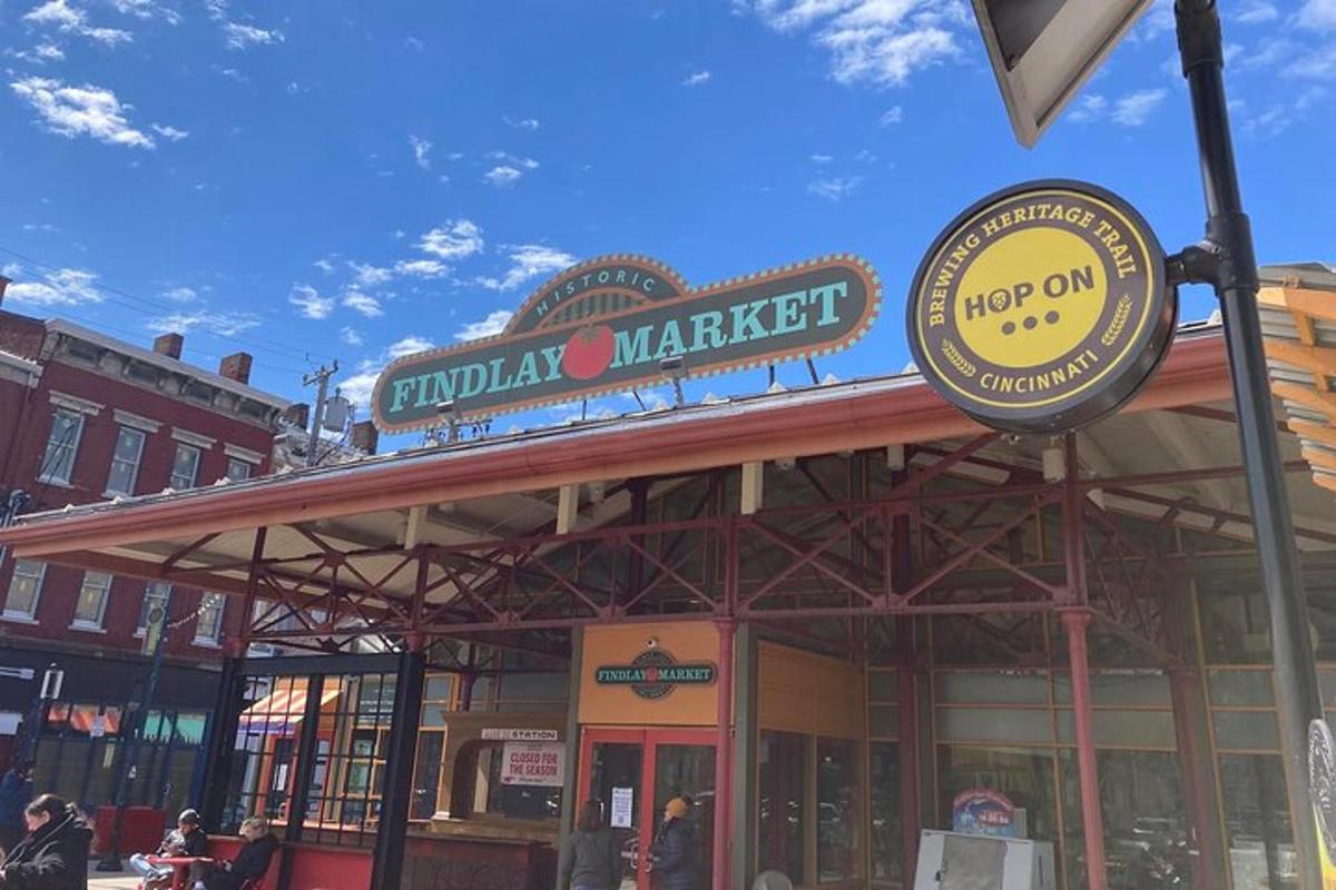 a market with a sign on top of a building
