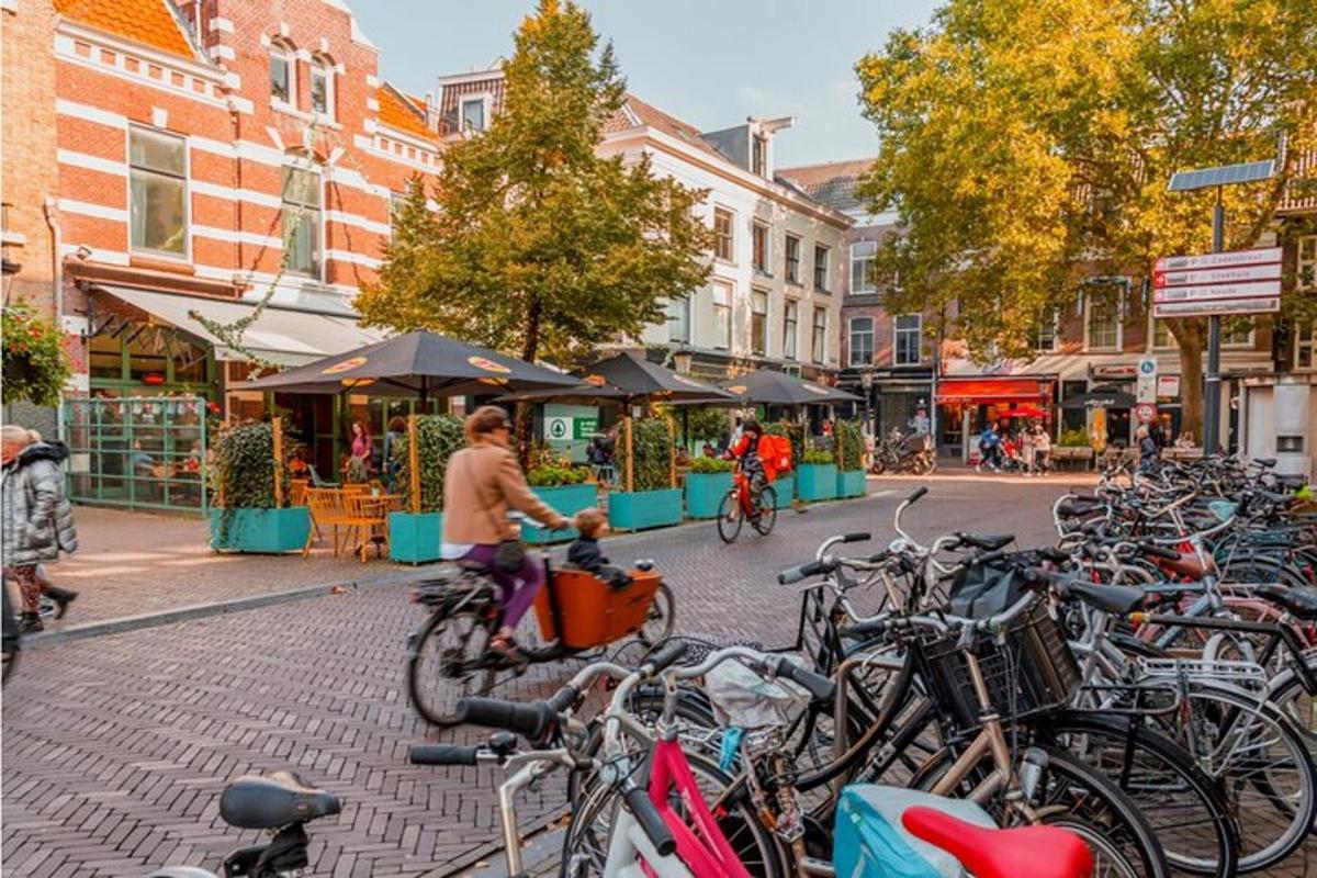 a group of bikes parked on a city street