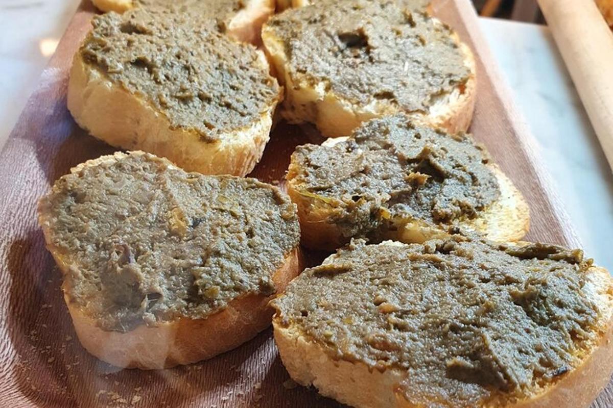 a group of four pieces of bread on a cutting board