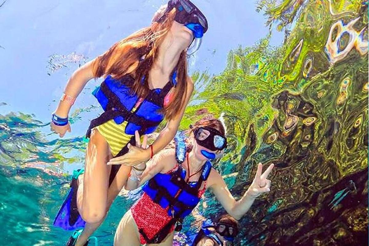 two women in the water in the ocean