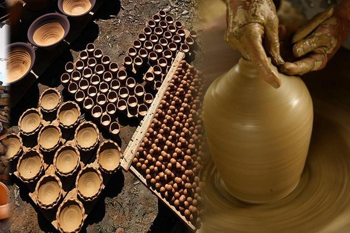 maður að búa til vasa á leirkerasmiðju