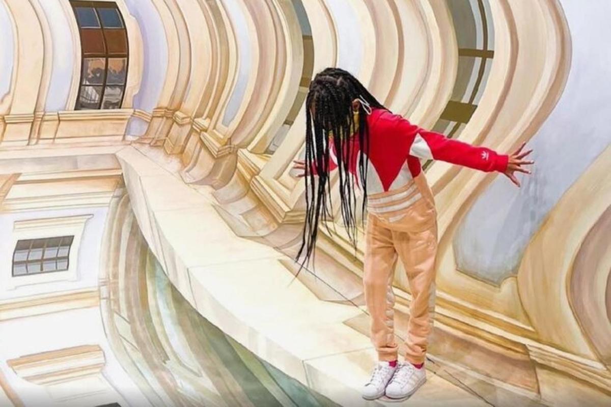 a painting of a child standing in a building