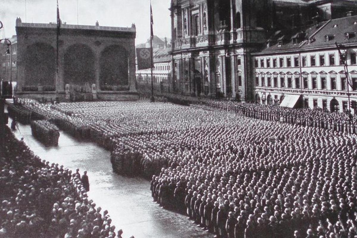 an old photo of a crowd of people in a city