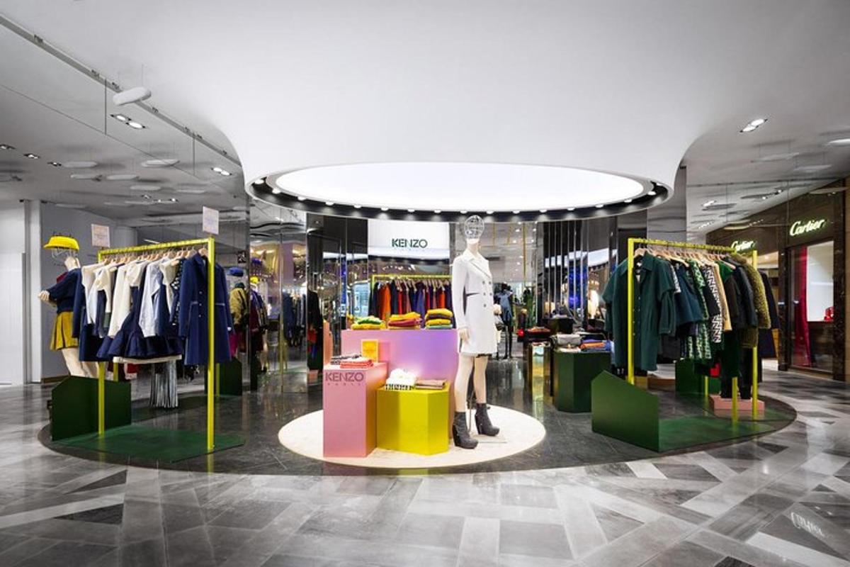 a clothing store with a mannequin in the middle