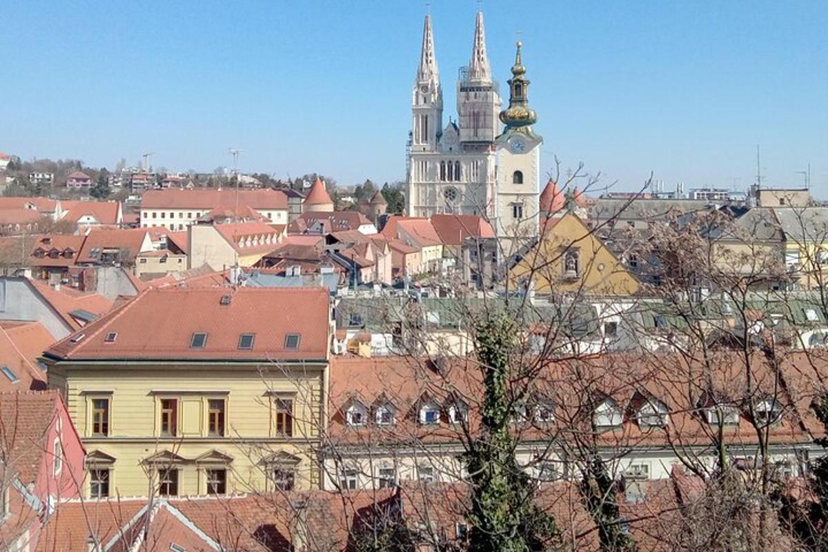a view of a city with buildings and towers