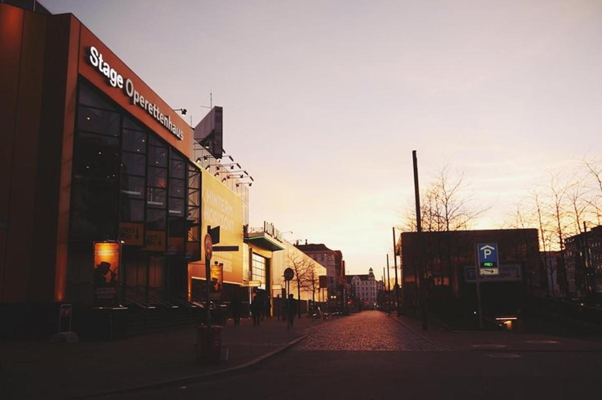 a city street with buildings on the side of the road