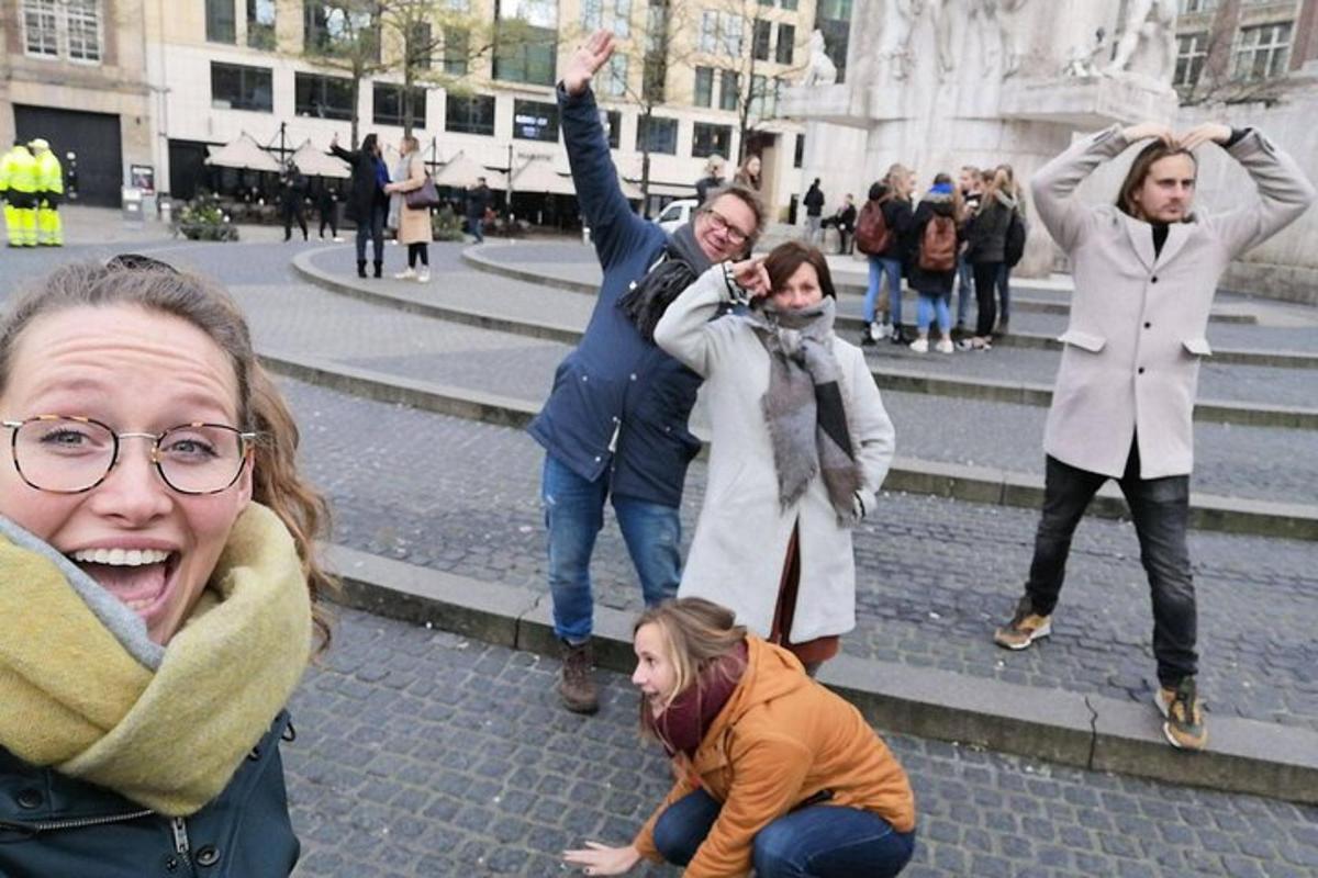 a group of people standing on the steps of a street