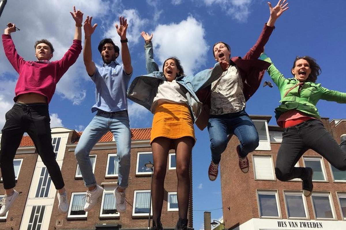 a group of young people jumping in the air
