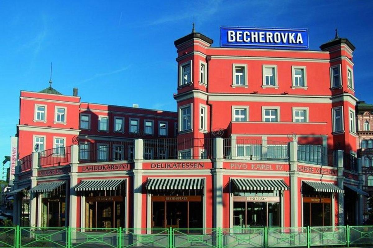 a large red building with a clock on it