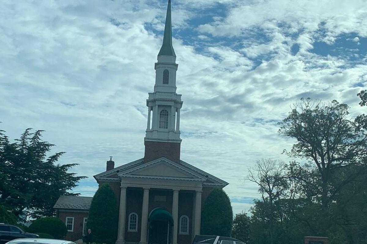 a large church with a steeple on top of it