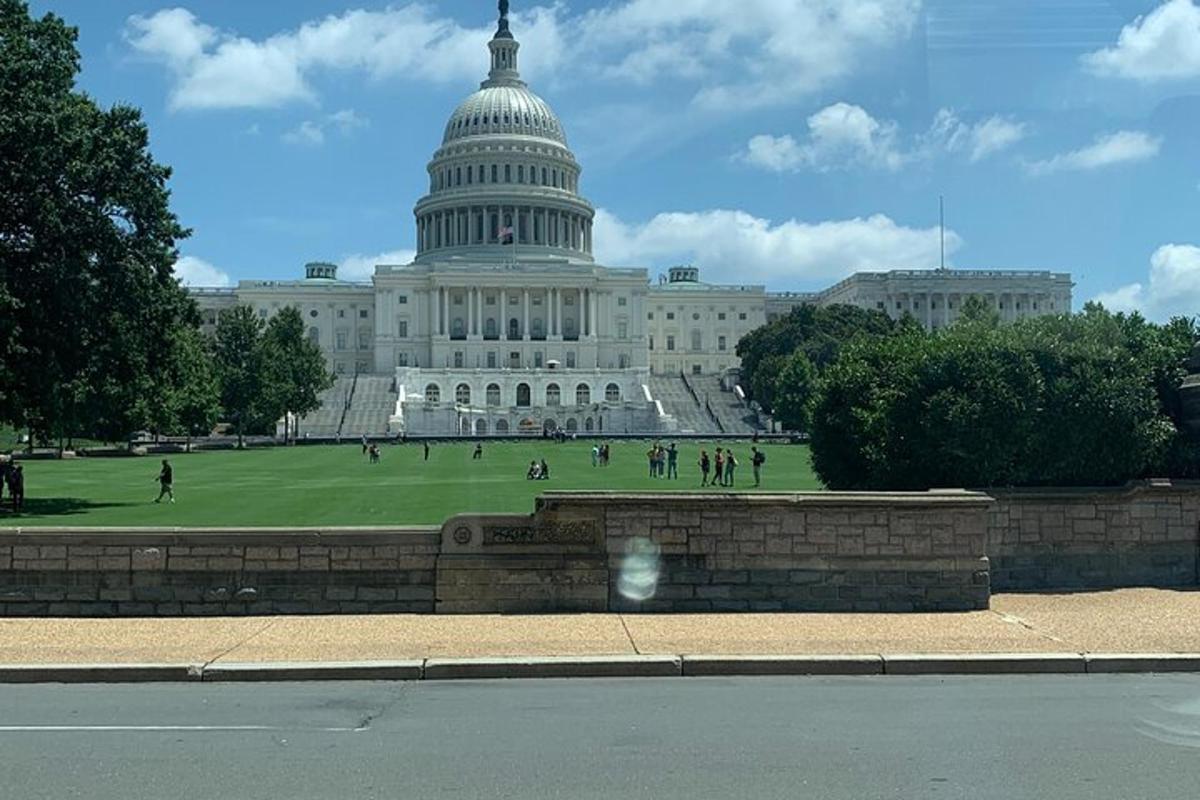 an image of the capitol building with people in front