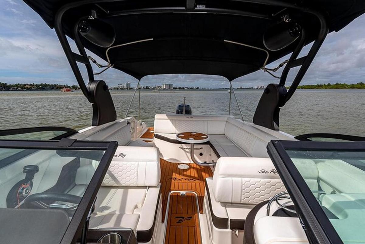 a boat sitting in the middle of the water