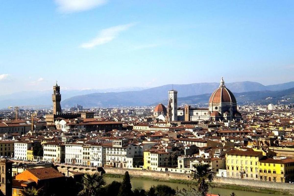 a view of a city with buildings and a river