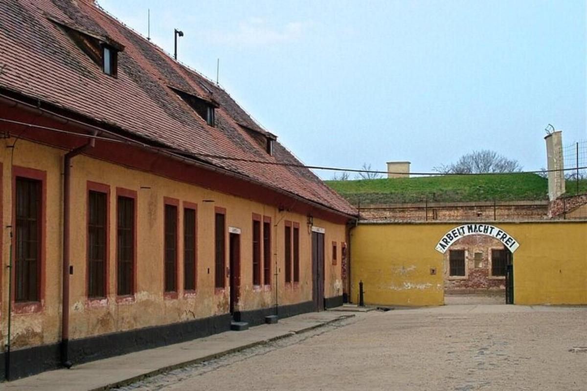 an empty street next to an old building