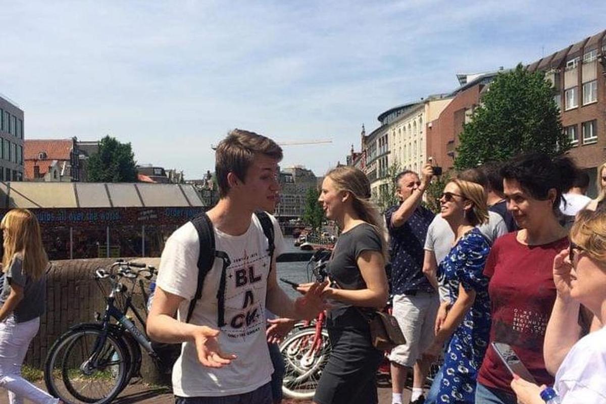 a group of people standing on a city street