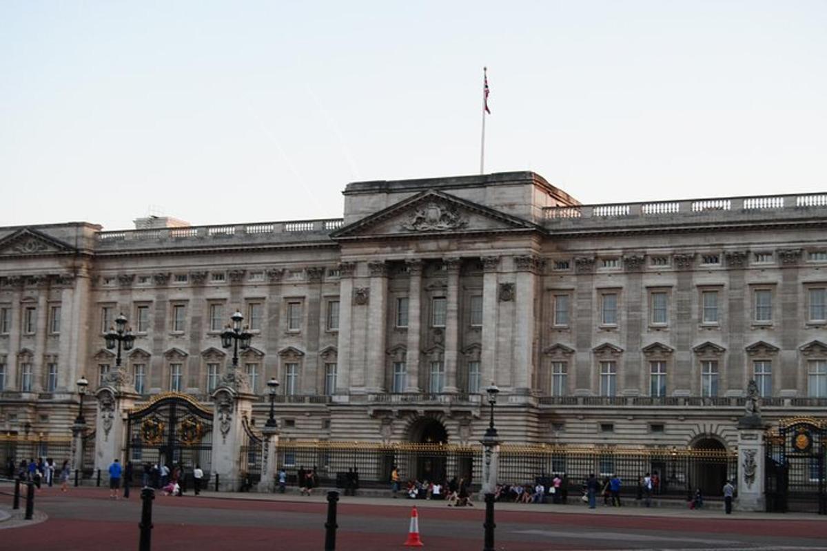 a large building with people standing outside of it