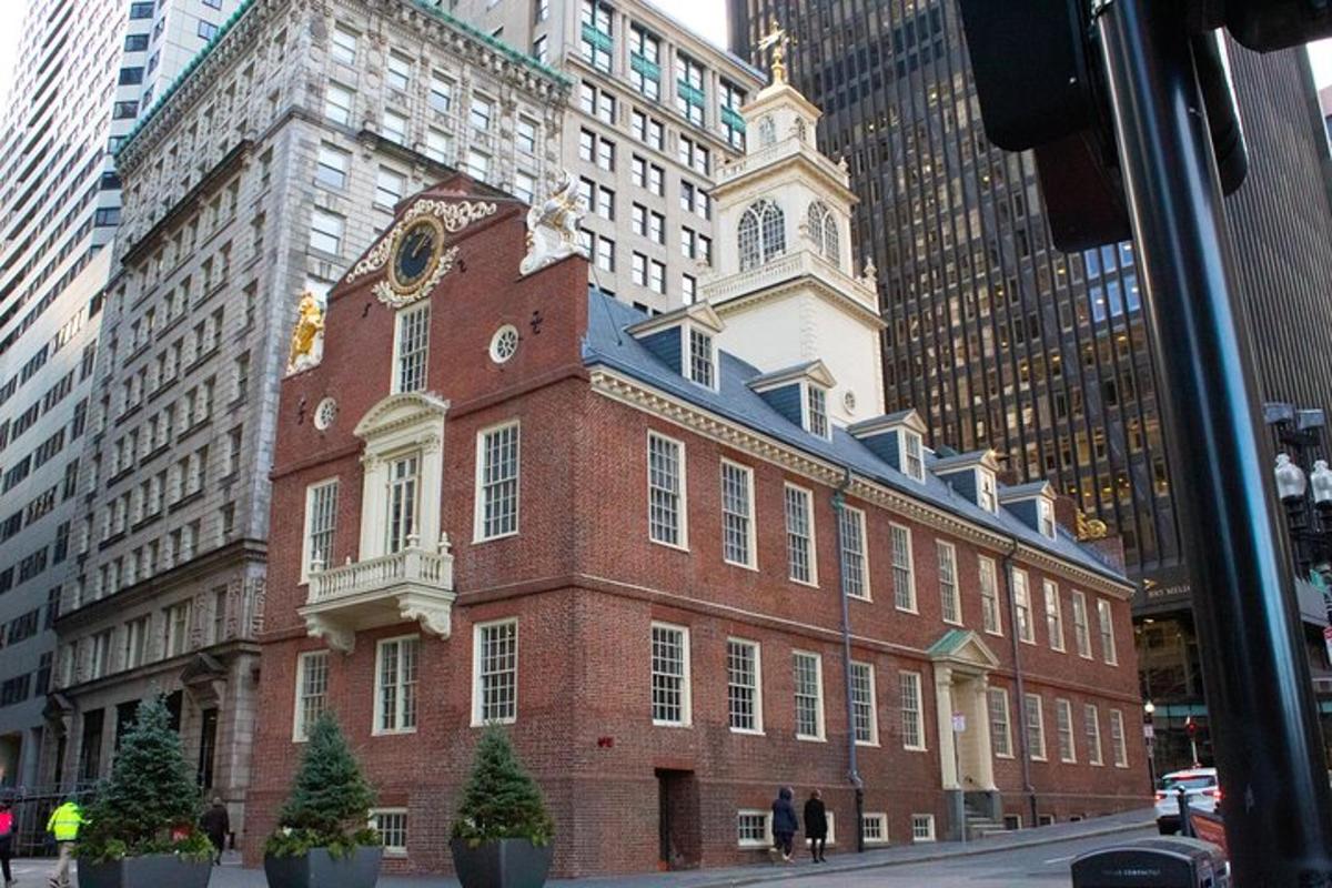 a large red brick building with a clock tower on it