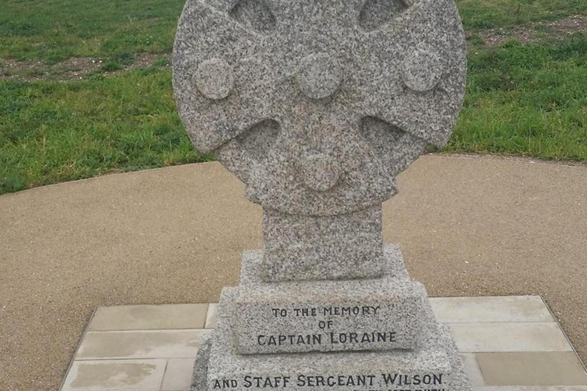 a statue of a rabbit on top of a sidewalk